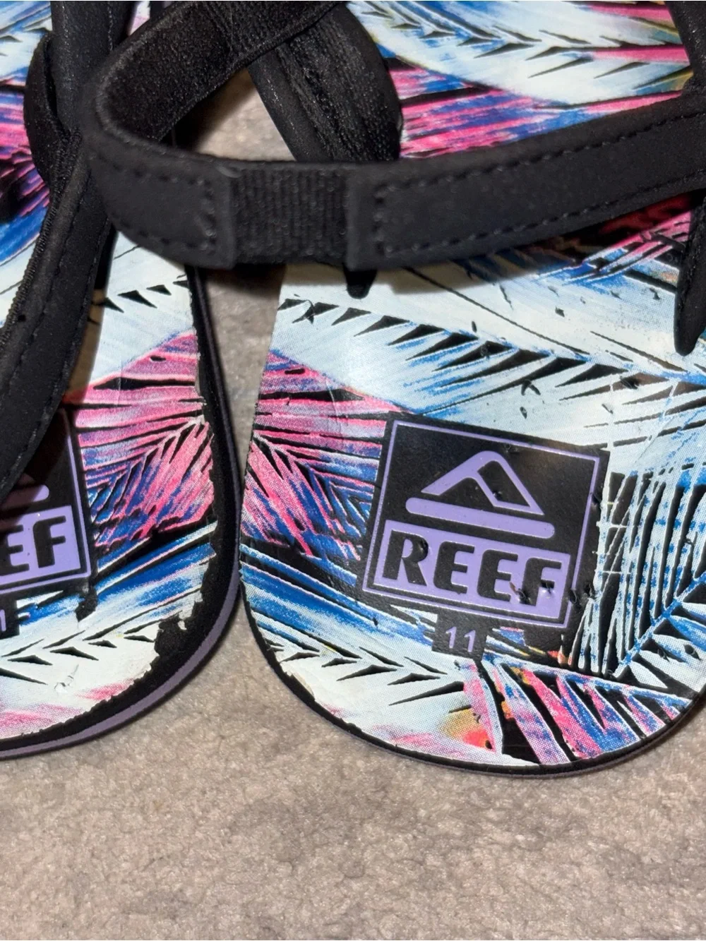 Reef Lil Ahi Toddler Black Sandals with Pink, Blue & Purple Tropical Print